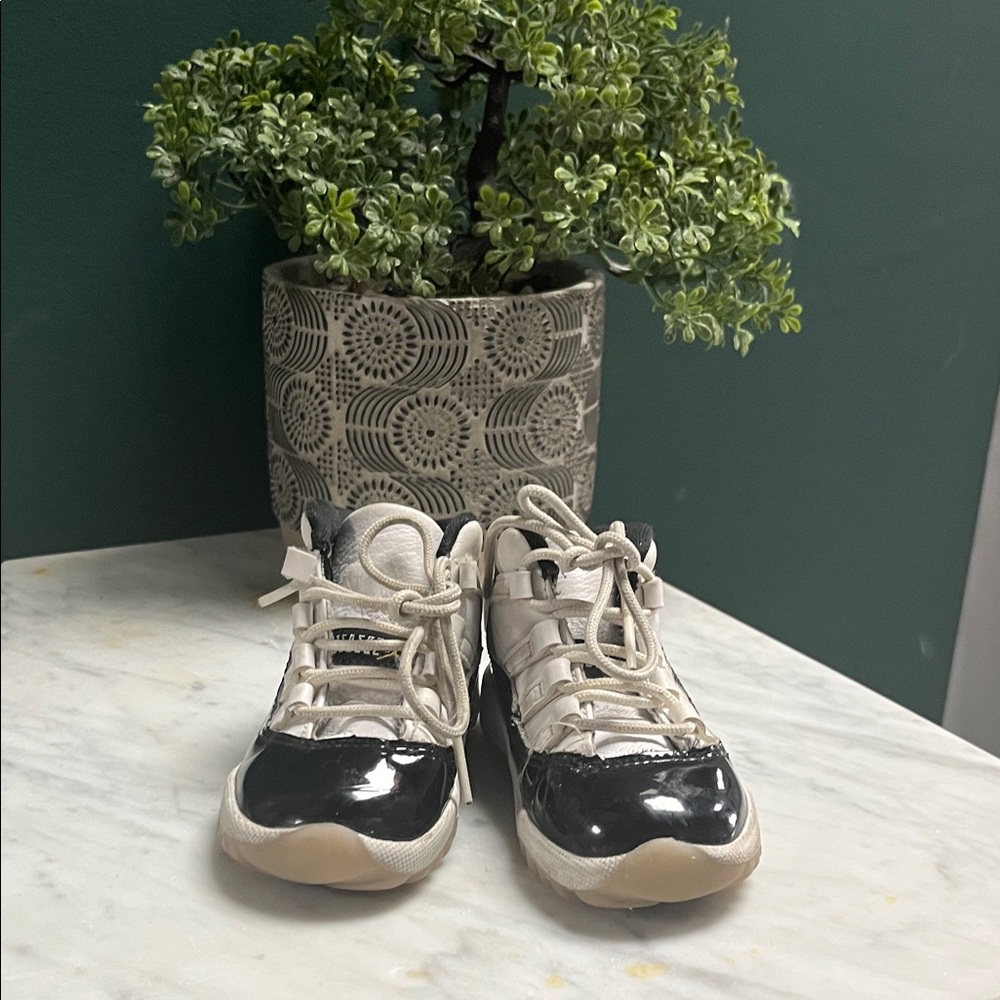 Jordan Kids Black and White High-Top Sneakers